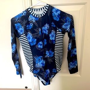 Blue floral one piece swimsuit with black and white stripe sleeves from Wonder N